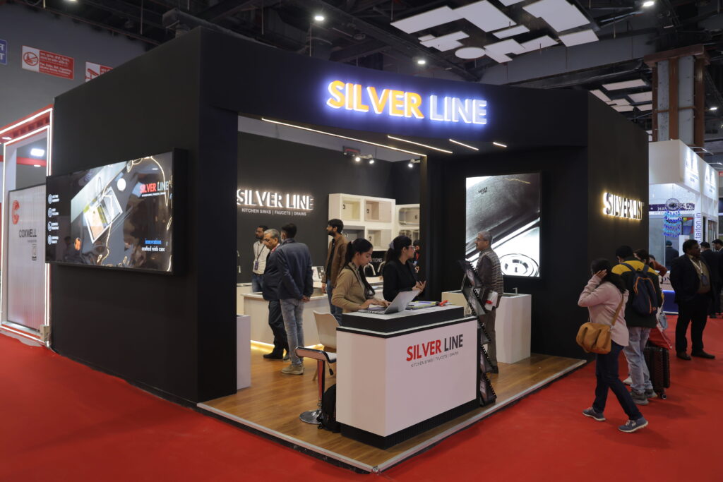 Exhibition stall design company in Delhi creating a premium exhibition booth with modern branding and product display